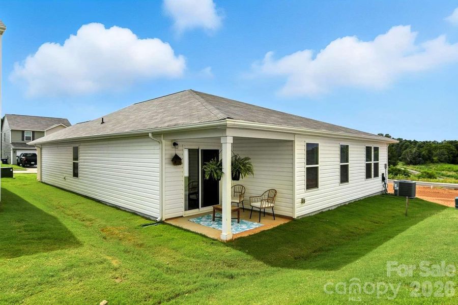 Exterior details and patio area of a home in Trivium, Newton (Image 3).
