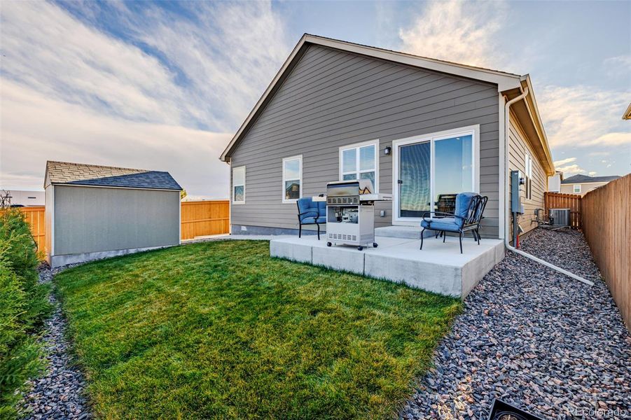 Fully landscaped with concrete patio, walkway, sod, rock, privacy trees and 6' privacy fence Fully landscaped with concrete patio, walkway, sod, rock, privacy trees and 6' privacy fence