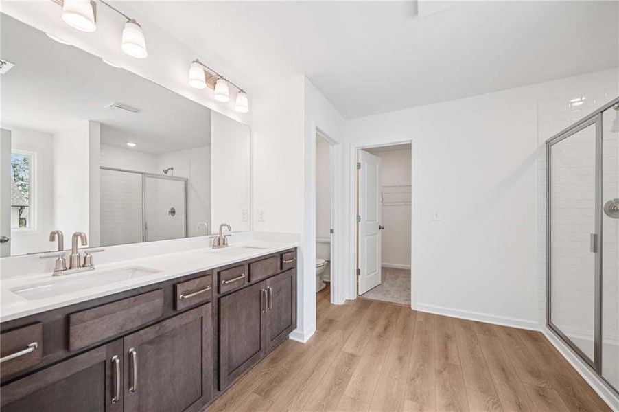 Furnished interior view inside a new home in Eastlyn Crossing, Flowery Branch (Image 9).