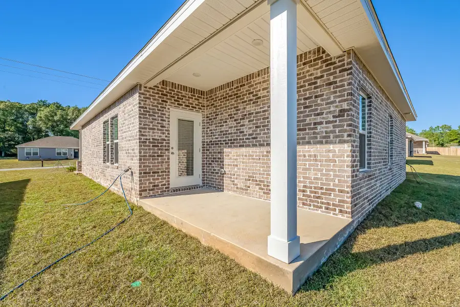 Exterior details and patio area of a home in McCarthy Estates, Defuniak Springs (Image 3). Exterior details and patio area of a home in McCarthy Estates, Defuniak Springs (Image 3).
