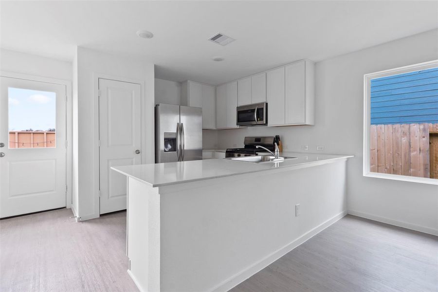 Furnished interior view inside a new home in Pinewood Trails, Cleveland (Image 7).