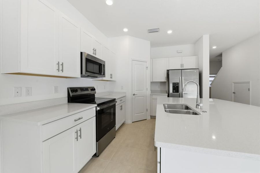Furnished interior view inside a new home in Vinterra Townhomes, Nokomis (Image 6).