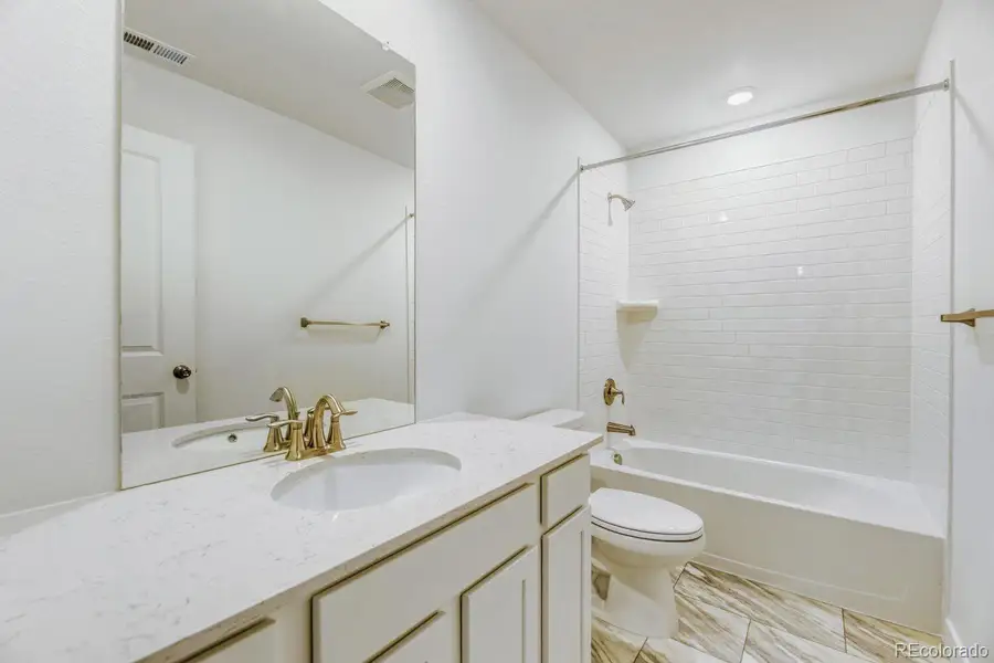 Furnished interior view inside a new home in Newlin Crossing, Parker (Image 11).