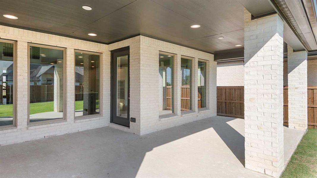 Exterior details and patio area of a home in Trinity Falls 50', McKinney (Image 4).