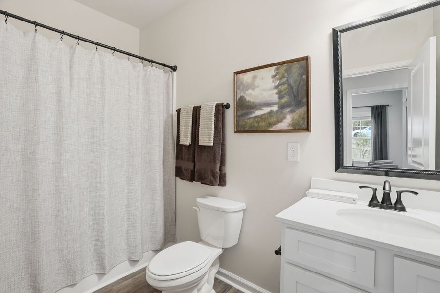 Representative furnished interior of a home built from the Myrtle Select M by McGuinn Homes in Broadway Lake, Anderson (Image 8).