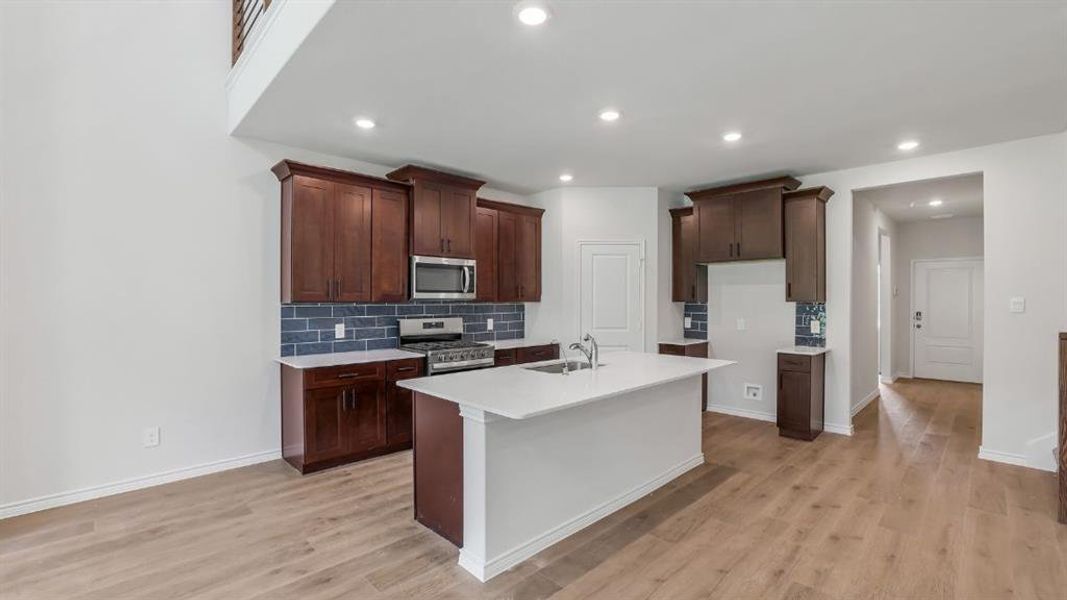 Furnished interior view inside a new home in The Landing at Hidden Lakes, McKinney (Image 3). Furnished interior view inside a new home in The Landing at Hidden Lakes, McKinney (Image 3).