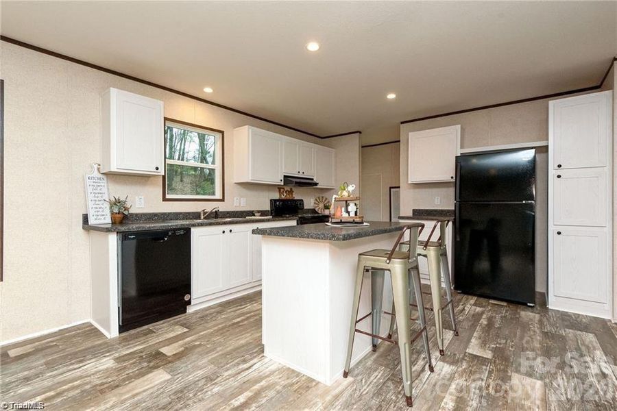Furnished interior view inside a new home in , Taylorsville (Image 3).
