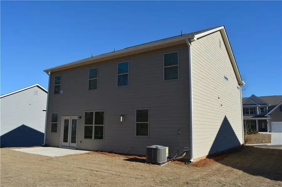 Front exterior of a new home in , Braselton, GA, highlighting curb appeal (Image 2). Front exterior of a new home in , Braselton, GA, highlighting curb appeal (Image 2).