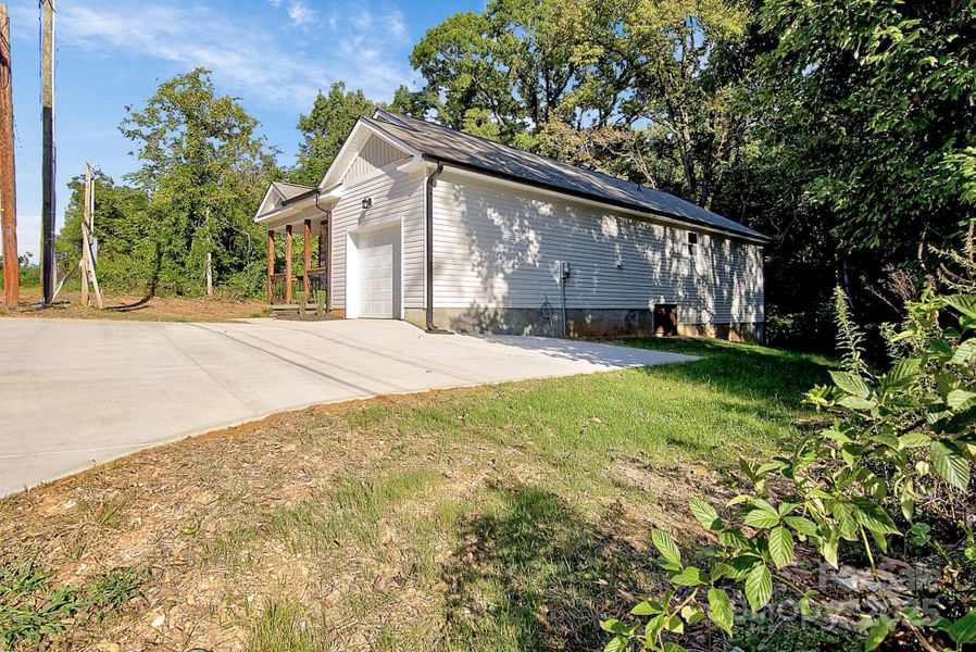 Front exterior of a new home in , Salisbury, NC, highlighting curb appeal (Image 25).