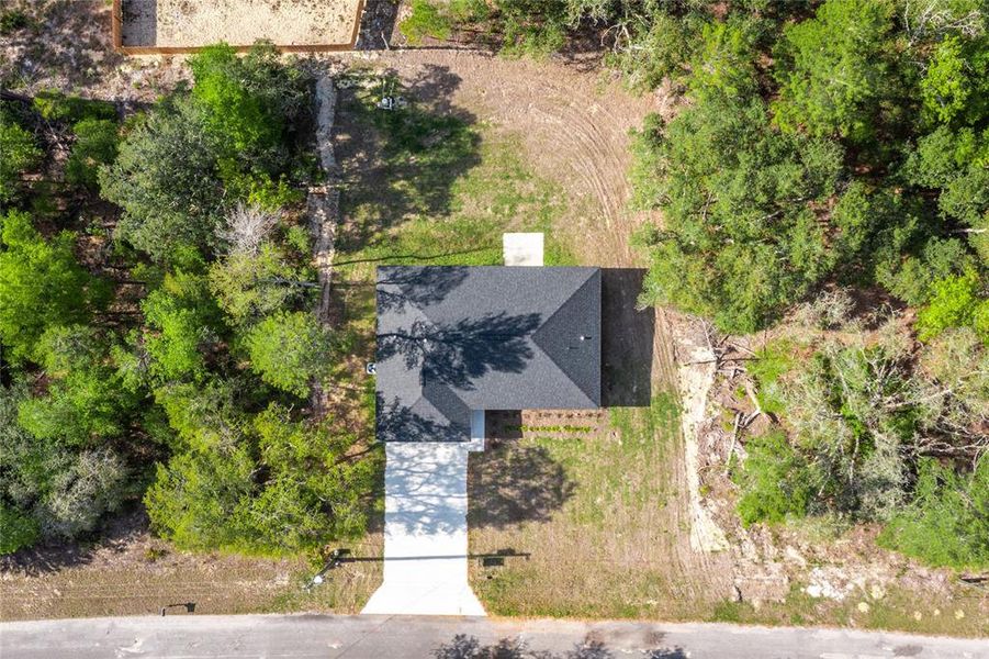 Front exterior of a new home in , Ocklawaha, FL, highlighting curb appeal (Image 22).