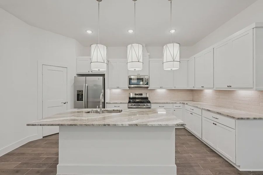 Representative furnished interior of a home built from the Pommery by Chesmar Homes in Kresston Chateau, Montgomery (Image 7). Representative furnished interior of a home built from the Pommery by Chesmar Homes in Kresston Chateau, Montgomery (Image 7).