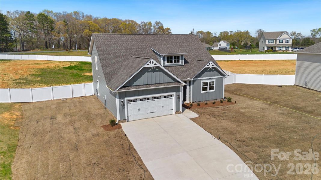Front exterior of a new home in , Stanfield, NC, highlighting curb appeal (Image 20).