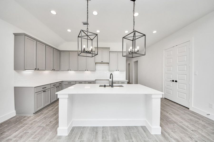 The extended counter area adds both practicality and style, making meal preparation a breeze. Every detail is thoughtfully designed to enhance the kitchen's functionality and aesthetic appeal. The extended counter area adds both practicality and style, making meal preparation a breeze. Every detail is thoughtfully designed to enhance the kitchen's functionality and aesthetic appeal.