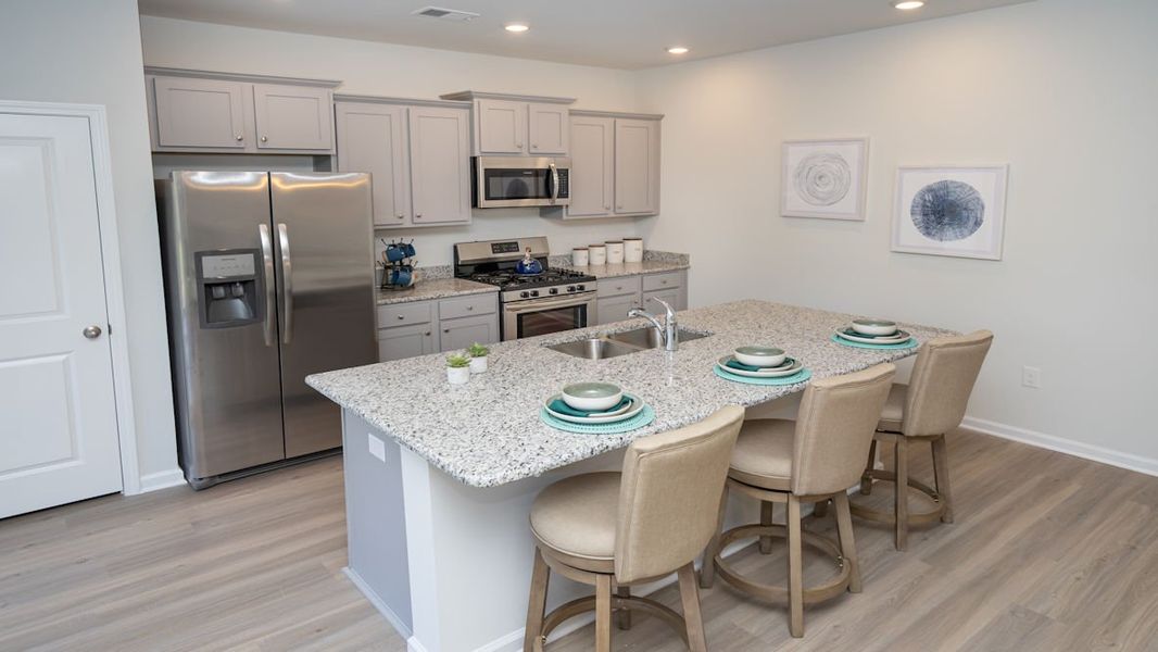 Representative furnished interior of a home built from the KERRY by D.R. Horton in Lochaven, Conway (Image 17).