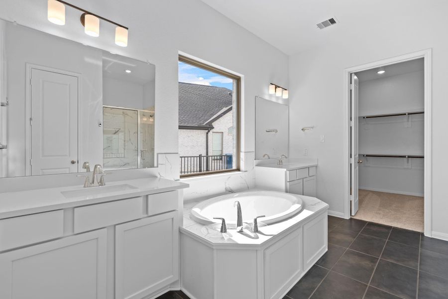 Furnished interior view inside a new home in Bridgeland 55', Cypress (Image 14).