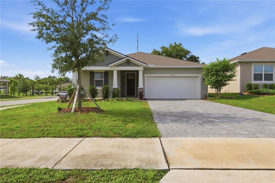 Front exterior of a new home in Grandview Gardens, Deland, FL, highlighting curb appeal (Image 24).