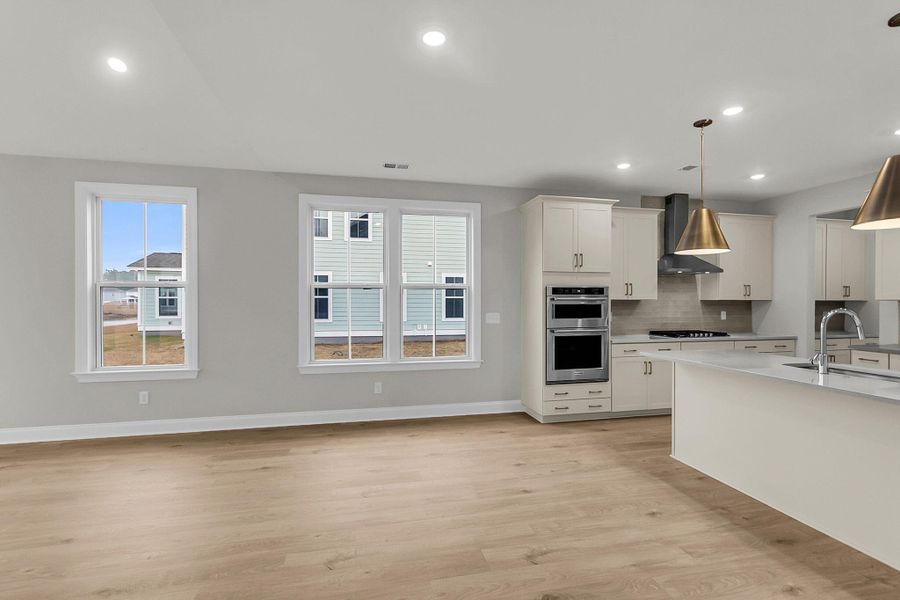 Spacious, unfurnished interior of a new home in Tidewater at Lakes of Cane Bay, Summerville (Image 21).