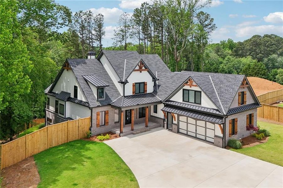 Front exterior of a new home in , Cumming, GA, highlighting curb appeal (Image 32). Front exterior of a new home in , Cumming, GA, highlighting curb appeal (Image 32).