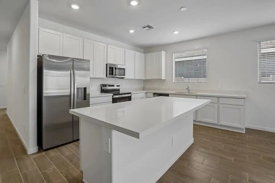Kitchen. Representative images and renderings are for illustrative purposes. Actual structural options and design finishes of home may vary.