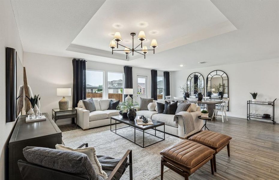 Gathering room drenched in natural light, creating a warm atmosphere *Model representation