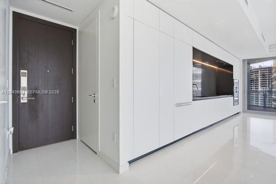 Furnished interior view inside a new home in Aston Martin Residences, Miami (Image 7).