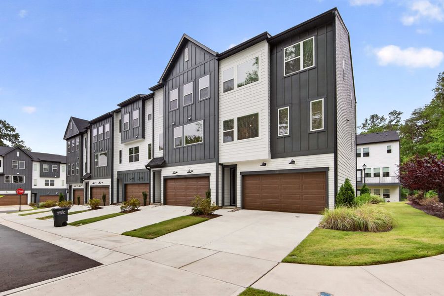 Front exterior of a new home in Archer Row, Charlotte, NC, highlighting curb appeal (Image 2). Front exterior of a new home in Archer Row, Charlotte, NC, highlighting curb appeal (Image 2).