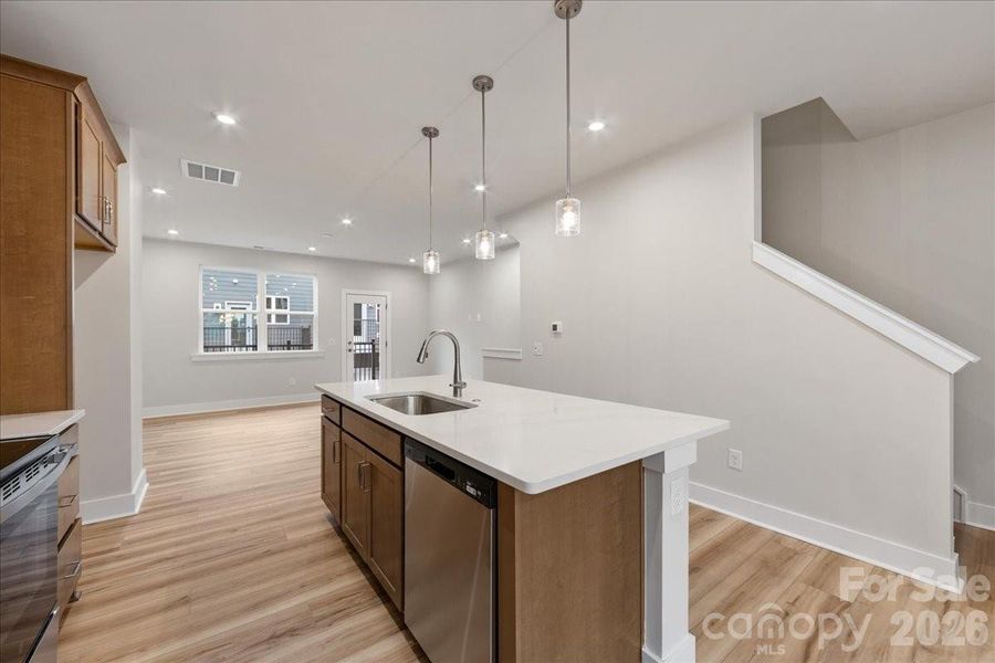 Large Kitchen Sink Located on the Island