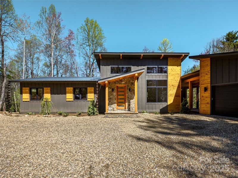 Front exterior of a new home in , Brevard, NC, highlighting curb appeal (Image 24).