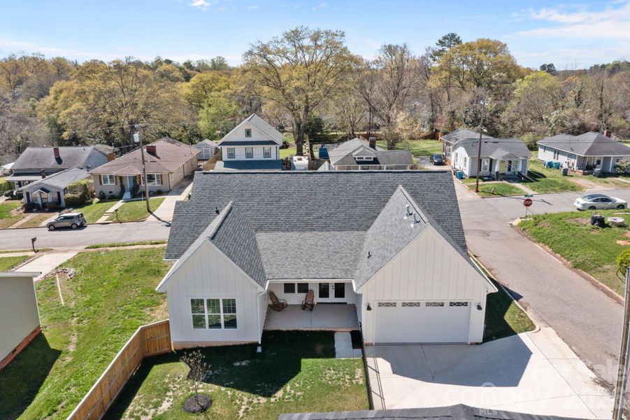 Front exterior of a new home in , Belmont, NC, highlighting curb appeal (Image 24).