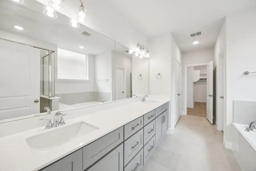 Representative furnished interior of a home built from the Regency II by Megatel Homes in Bellagio, Forney (Image 5).