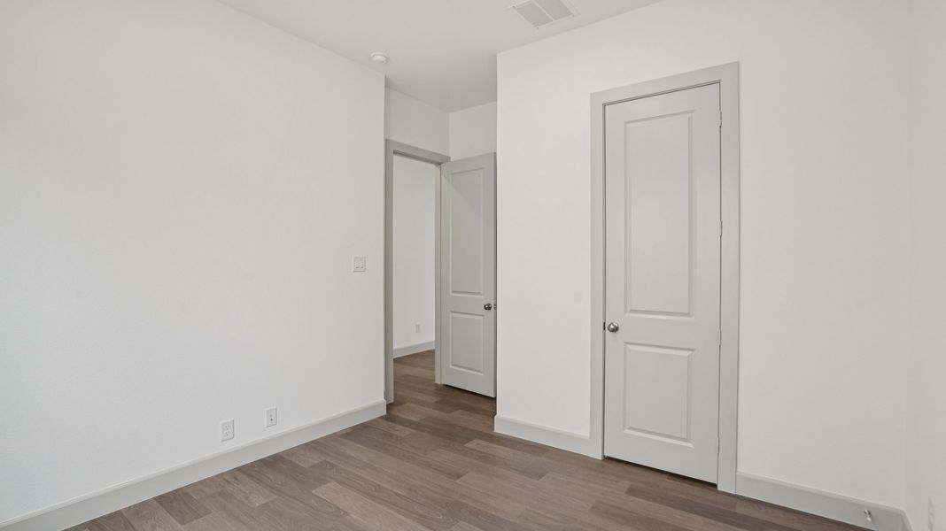 Representative unfurnished interior of a home built from the Brice III by Normandy Homes in Rainwater Crossing, Celina (Image 17). Representative unfurnished interior of a home built from the Brice III by Normandy Homes in Rainwater Crossing, Celina (Image 17).