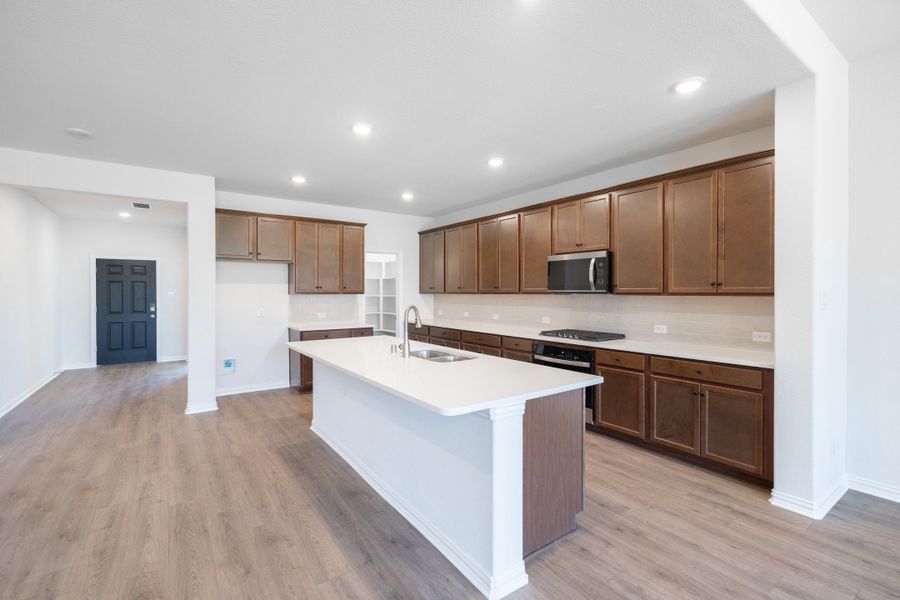 Furnished interior view inside a new home in Lake Pointe, Little Elm (Image 7).