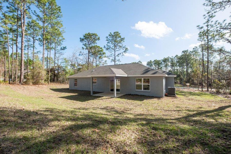 Exterior details and patio area of a home in , Citrus Springs (Image 27).