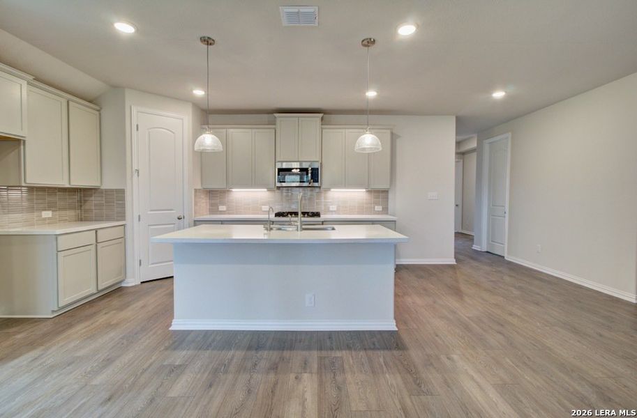 Furnished interior view inside a new home in Stream Waters, Seguin (Image 9).