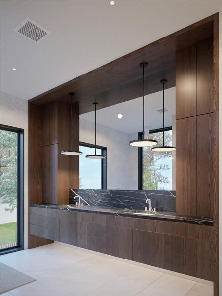 Kitchen featuring modern cabinets, dark countertops, pendant lighting, and recessed lighting