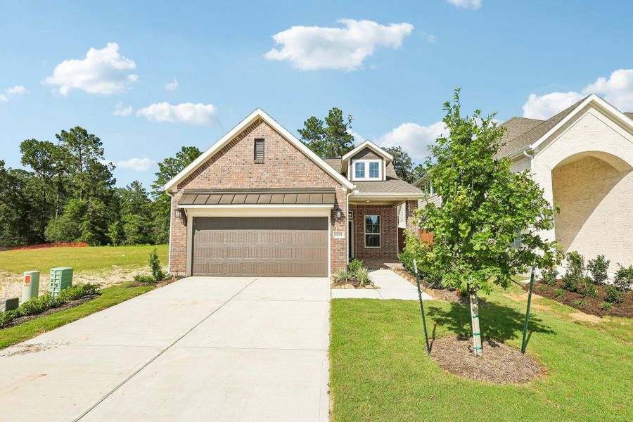 Front exterior of a new home in Evergreen 40s, Conroe, TX, highlighting curb appeal (Image 17). Front exterior of a new home in Evergreen 40s, Conroe, TX, highlighting curb appeal (Image 17).
