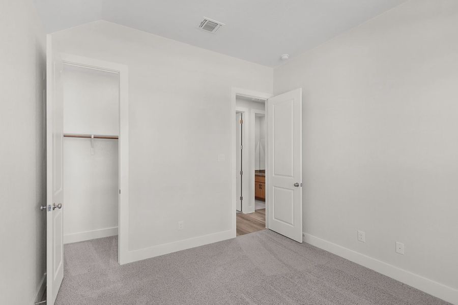 Representative unfurnished interior of a home built from the Parker by Chesmar Homes in Highland Village, Georgetown (Image 16). Representative unfurnished interior of a home built from the Parker by Chesmar Homes in Highland Village, Georgetown (Image 16).