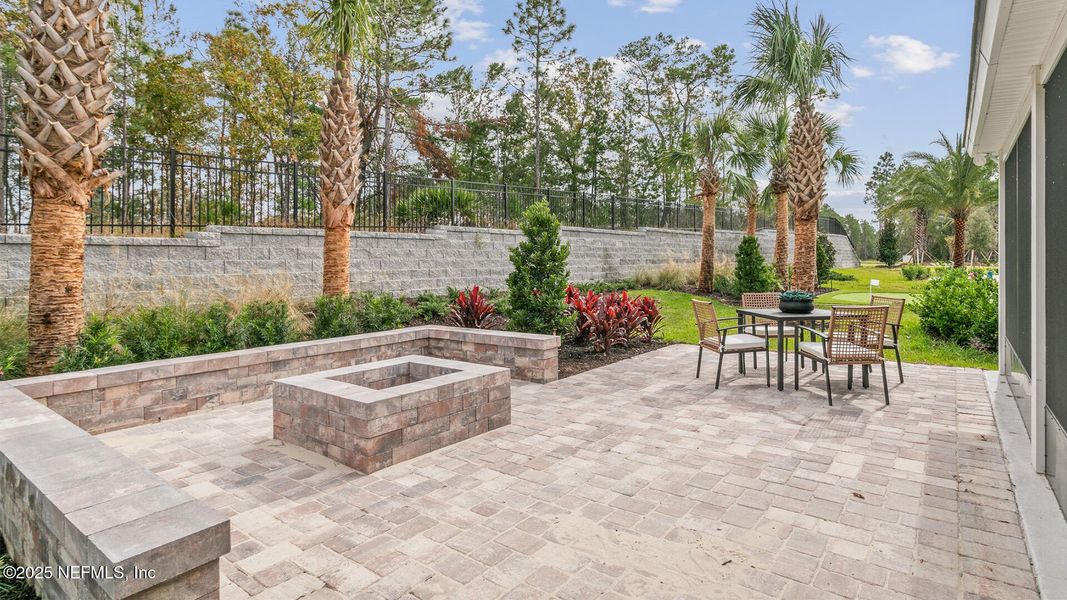 Exterior details and patio area of a home in Sawmill Branch, Palm Coast (Image 2).