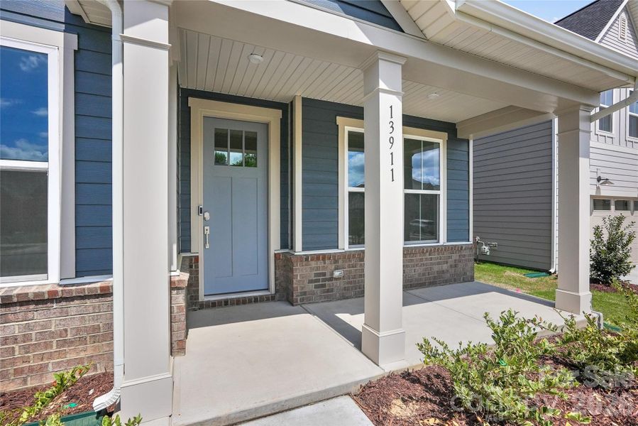Exterior details and patio area of a home in Parkside Crossing, Charlotte (Image 3).
