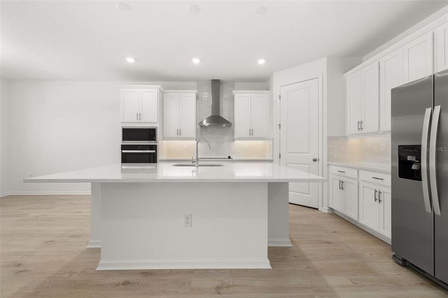 Furnished interior view inside a new home in Serenade at Ovation, Winter Garden (Image 9). Furnished interior view inside a new home in Serenade at Ovation, Winter Garden (Image 9).