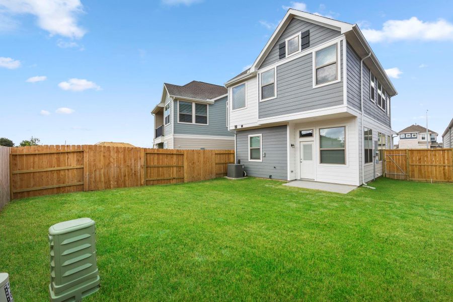 Exterior details and patio area of a home in Marvida, Cypress (Image 3).