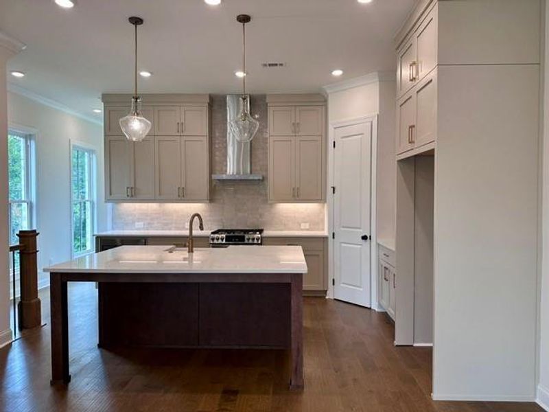 Furnished interior view inside a new home in Ward's Crossing Townhomes, Johns Creek (Image 7). Furnished interior view inside a new home in Ward's Crossing Townhomes, Johns Creek (Image 7).