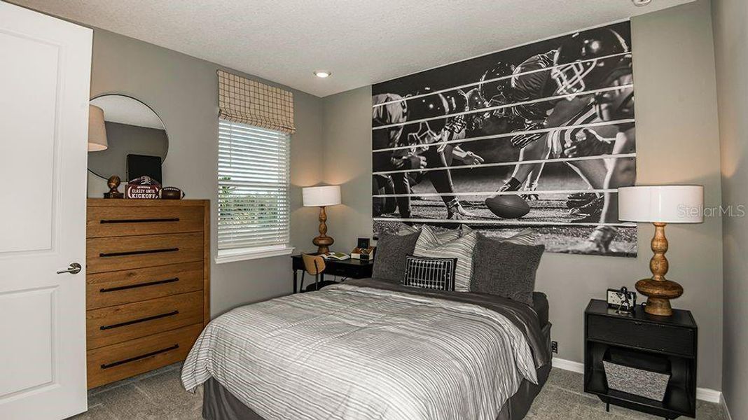 Furnished interior view inside a new home in Westview Community Group Page, Kissimmee (Image 12).