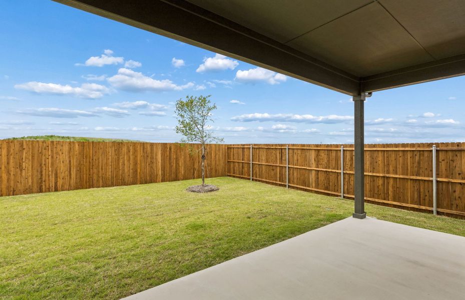 Exterior details and patio area of a home in Whitewing Trails, Princeton (Image 3).