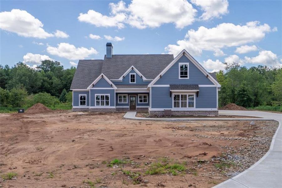 Front exterior of a new home in , Social Circle, GA, highlighting curb appeal (Image 2).