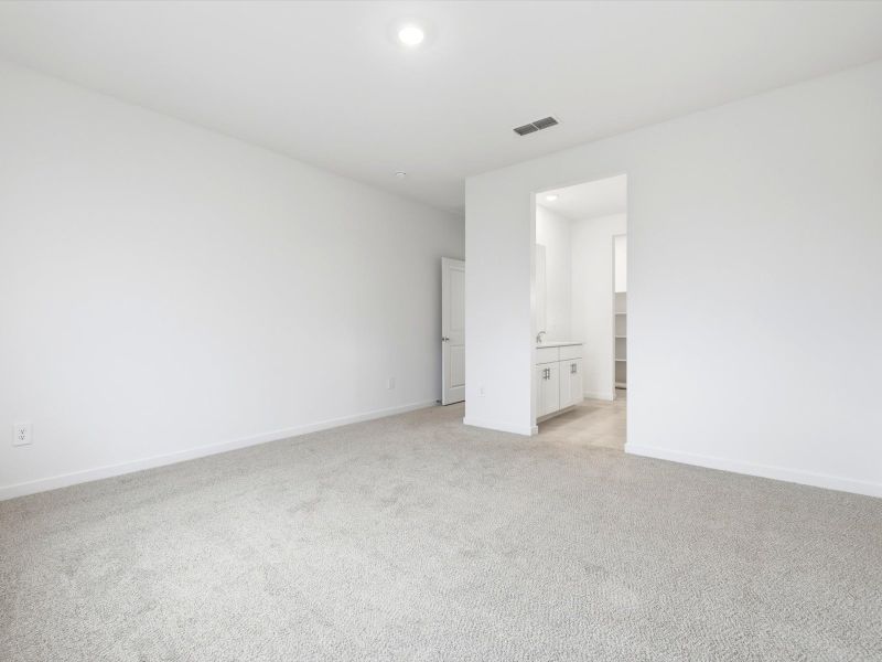 Spacious, unfurnished interior of a new home in Rancho Mirage Estate Series, Maricopa (Image 13).