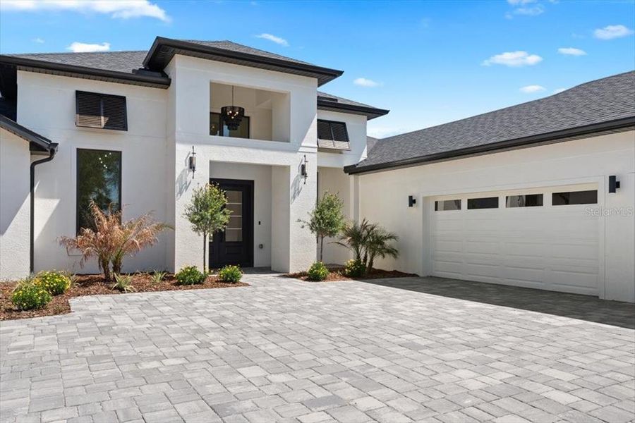 Front exterior of a new home in , Palm Coast, FL, highlighting curb appeal (Image 29). Front exterior of a new home in , Palm Coast, FL, highlighting curb appeal (Image 29).