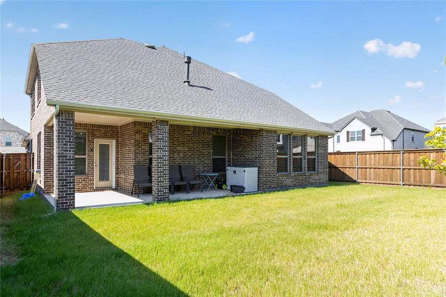 Exterior details and patio area of a home in , Little Elm (Image 2). Exterior details and patio area of a home in , Little Elm (Image 2).