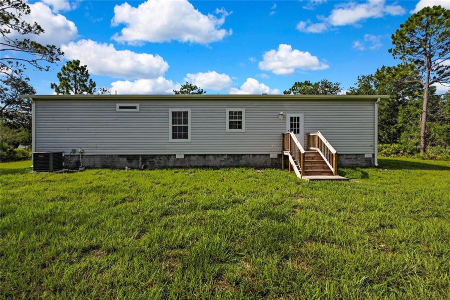 Front exterior of a new home in , Homosassa, FL, highlighting curb appeal (Image 30).