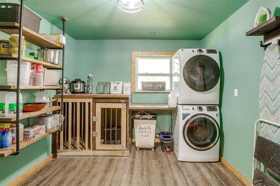 Utility room with built-in shelving.